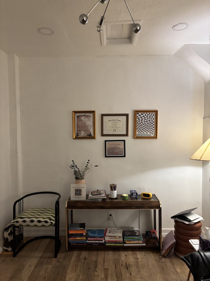 Therapy room with bookshelf and artwork